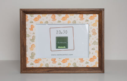 Cornice in legno marrone 20x30 con passepartout in tessuto a tema dinosauri